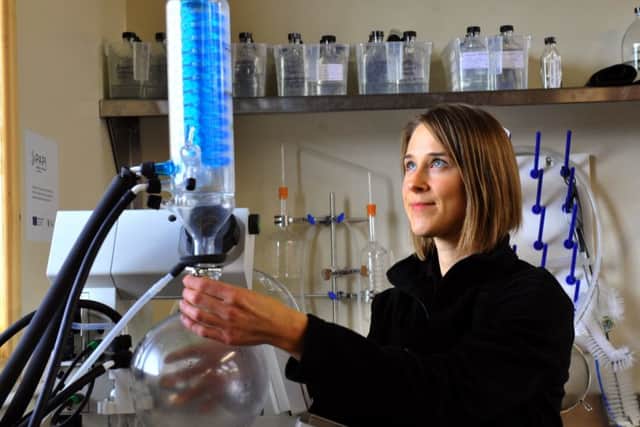 Still: Abbie Nelson, co-founder of Cooper King Distillery, which received funding for a copper pot whisky still and rotary evaporator.