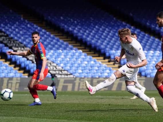 Leeds United Under-23s playmaker Mateusz Bogusz scores at Selhurt Park.