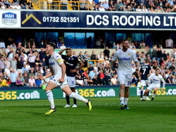MEMORABLE: Winge Jack Harrison wheels away to celebrate his first goal for Leeds United and first goal in English football which sealed a last-gasp 1-1 draw at Millwall back in September