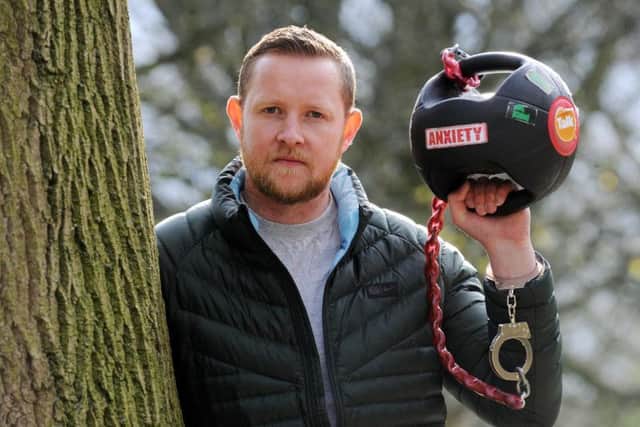 Army veteran Christian Kisby a Yorkshire Regiment veteran who is spending a week with a 15kg weighted ball handcuffed to his wrist in a bid to raise awareness of PTSD in soldiers