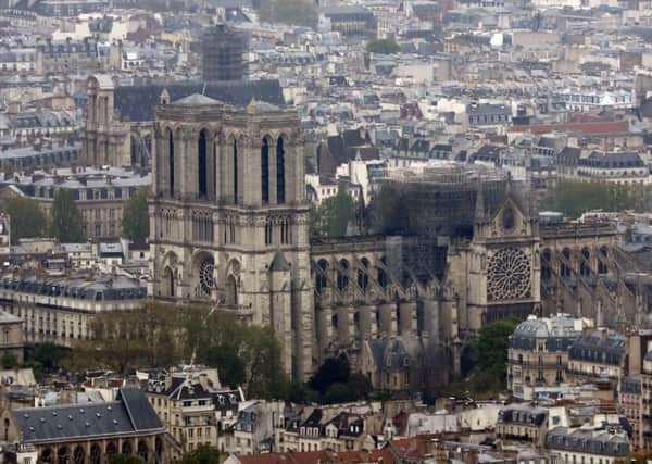 The blackened Notre Dame cathedral in Paris after Monday's devastating fire.