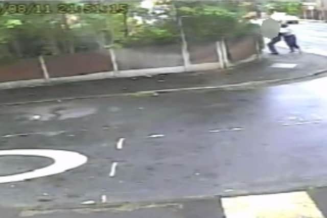 The attack in the Levenshulme area of Manchester was caught on CCTV