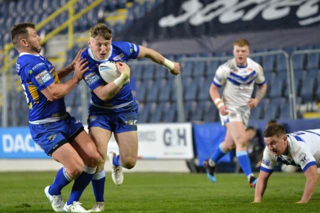 Harry Newman scores his fourth try against Workington in the Challenge Cup.