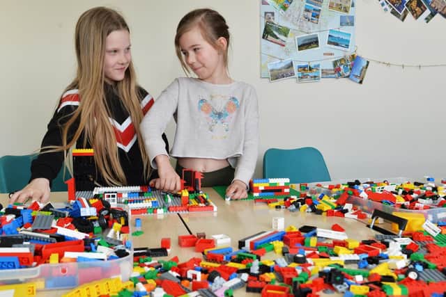 Cadence and Melissa playing with Lego at the LS14 Trust in Seacroft. Picture: Bruce Rollinson