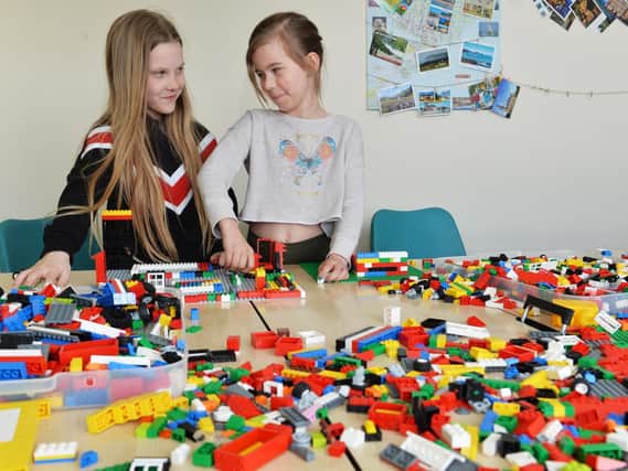 Cadence and Melissa playing with Lego at the LS14 Trust in Seacroft. Picture: Bruce Rollinson