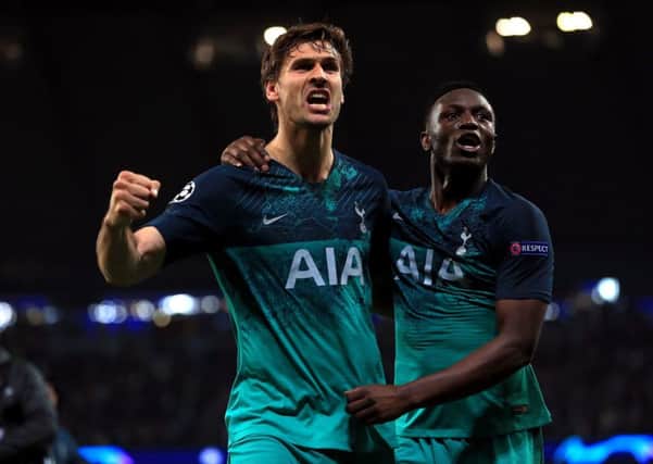 Tottenham Hotspur's Fernando Llorente and Victor Wanyama (right) celebrate after the final whistle.