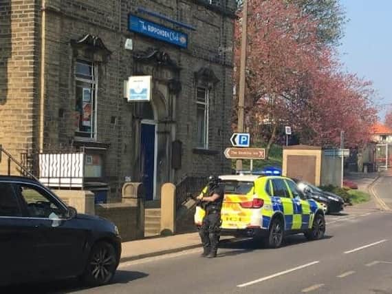 Armed police rushed to Sowerby Bridge yesterday after reports of a man with a firearm.