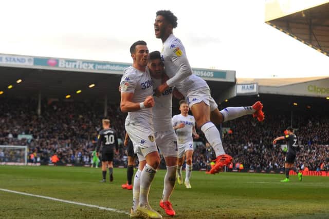 Pablo Hernandez and Tyler Roberts congratulate Jack Harrison.  Picture Tony Johnson.
