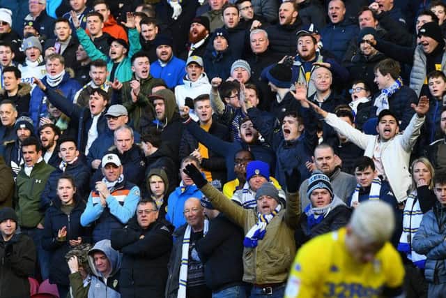 Fans cheering on Leeds United.
