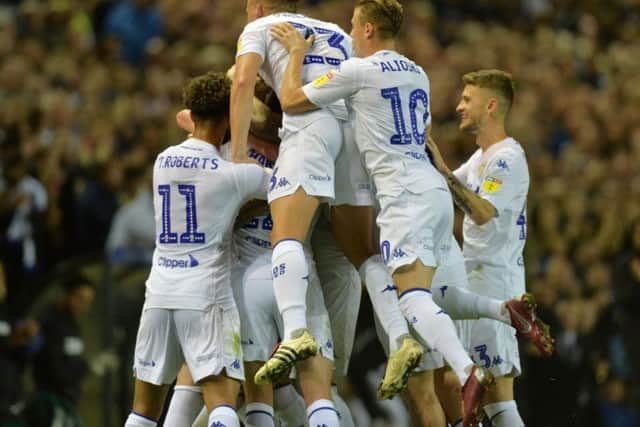 Leeds United players celebrate at Elland Road.