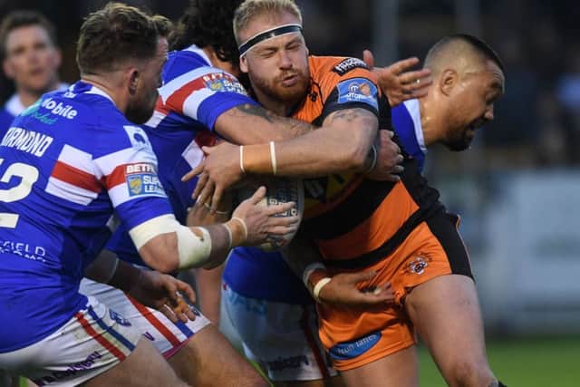 Castleford's Oliver Holmes picked up a knee injury against Wakefield.