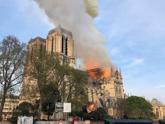 NOTRE DAME: Cash donations from France's billionaires came flooding in as the embers died down