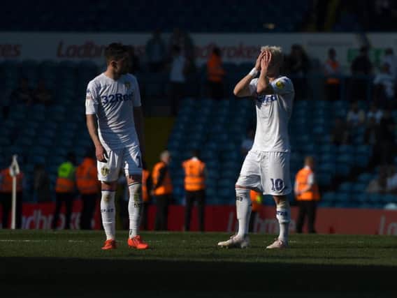 Leeds United's Pablo Hernandez and Gjanni Alioski react at full-time.
