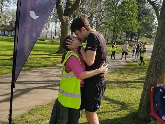 He said yes! This was the moment Lucy Rider and Alan Lumb got engaged at the finish line of Woodhouse Moor ParkRun - where they met three years ago.