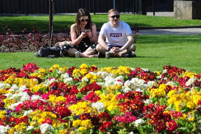People enjoying the sunshine in Leeds on Saturday