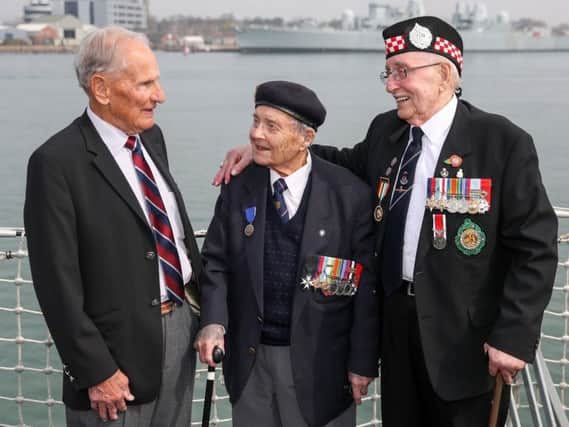 D-Day veterans Greg Hayward, 93, who served with the RAF, Eric Strange, 95, who served with the Royal Navy and Leonard Williams, 93, who served with the Argyll and Sutherland Highlanders on board HMS St Albans, during an announcement for D-Day 75th anniversary commemorations.