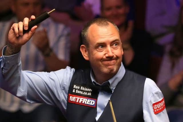 Mark Williams celebrates his victory over Martin Gould at The Crucible. Picture: Nigel French/PA