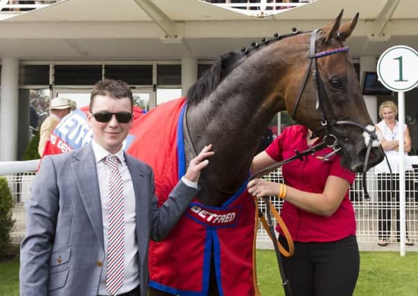 Trainer David Griffiths, pictured with Take Cover, is hoping Ornate can pick up where his retired charge left off. PIC: Chris Ison/PA Wire