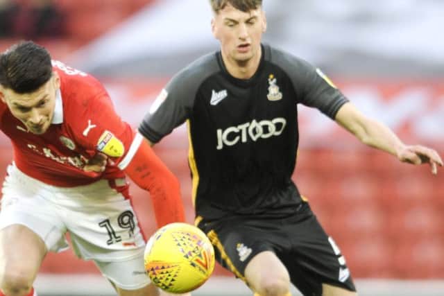 Leeds United defender Paudie O'Connor is action for Bradford City.
