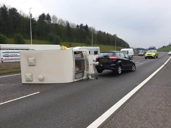 An overturned caravan on the M62 (Photo: @WYP_TrafficDave)