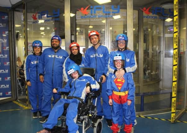 DAREDEVILS: A team from Little Hiccups at an indoor skydiving session at i Fly. The charity, whose hashtag is #Nolimits, has also done skiing.