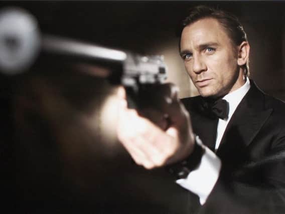 UNDATED: In this undated handout photo from Eon Productions, actor Daniel Craig poses as James Bond. Craig was unveiled as legendary British secret agent James Bond 007 in the 21st Bond film Casino Royale, at HMS President, St Katharine's Way on October 14, 2005 in London, England. (Photo by Greg Williams/Eon Productions via Getty Images)
ByLine: Greg Williams