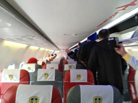Leeds United club badges were draped over each seat on the plane