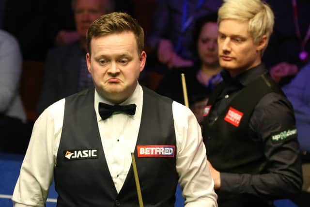 Shaun Murphy (left) and Neil Robertson during day seven of the 2019 Betfred World Championship.