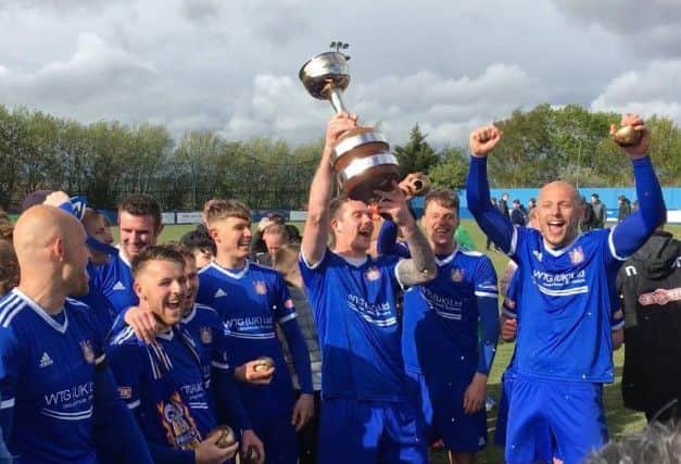 Farsley Celtic players celebrate prmotion and the Evo-Stik League Premier Division title. Picture: John McEvoy.