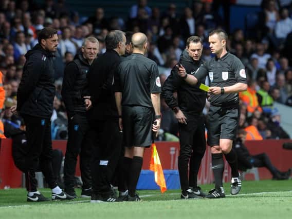 Leeds United head coach Marcelo Bielsa booked by referee Stuart Attwell.