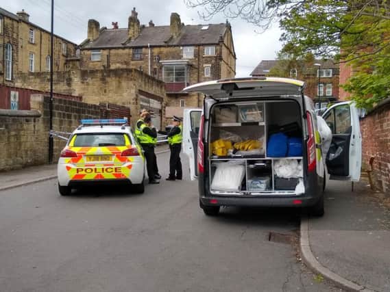 Police forensics teams were still at the scene on Sunday afternoon.