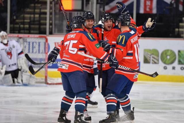 GB's players celebrate Mark Richardson's first-minute opener against Topredo at Sheffield Arena. Picture: Dean Woolley.