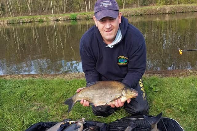 Moortowns Andy Limbert shows part of his bream catch from the Aire and Calder Navigation that made a day off work all worthwhile.