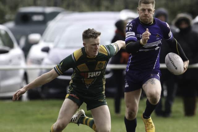 Hunslet Warriors' Jordan Gale on the attack against Oldham St Anne's. Picture: Ainsley Bennett.