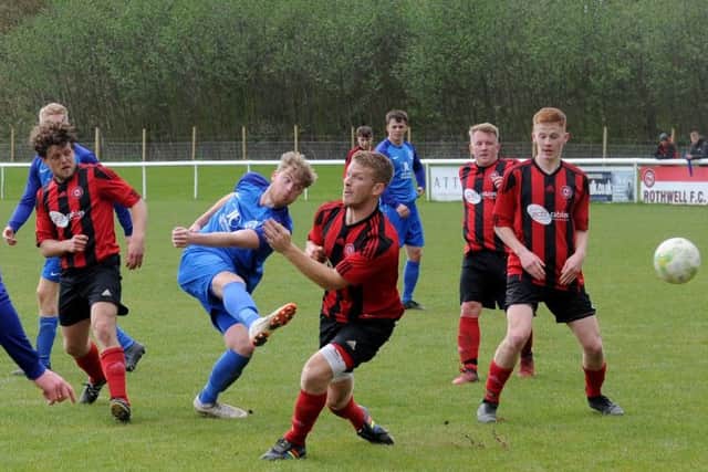Luke Fletcher shoots for Boroughbridge in the 3-0 win at Rothwell. PIC: Steve Riding