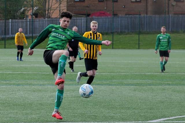 Jayden Harding tries a shot for Division 4 champions Middleton Park against Norristhorpe. PIC: Steve Riding