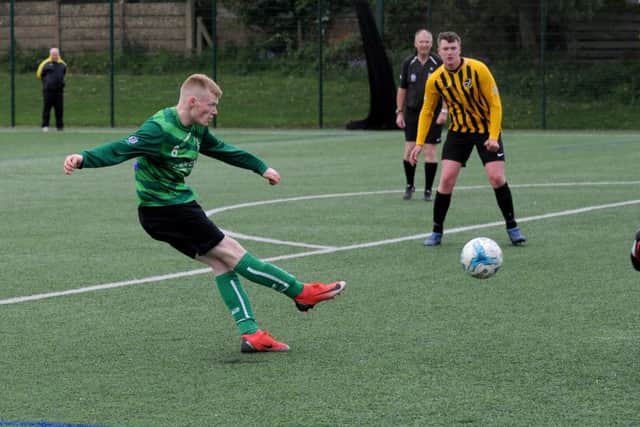 Bradley Noble scores the third goal in a 3-1 win for Middleton Park over Norristhorpe Reserves that sealed the Yorkshire Amateur League Division 4 title. PIC: Steve Riding