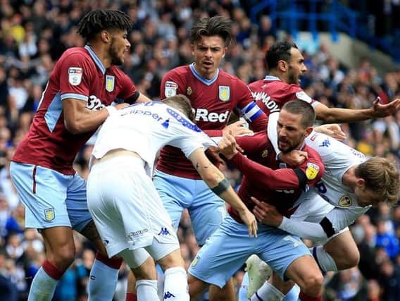 CHAOS: Leeds United's Mateusz Klich and Aston Villa's Conor Hourihane clash after Klich's controversial strike in last weekend's 1-1 draw at Elland Road.