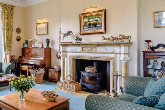 A beautifully bright space with dual aspect windows overlooking the beautiful gardens and parkland beyond.