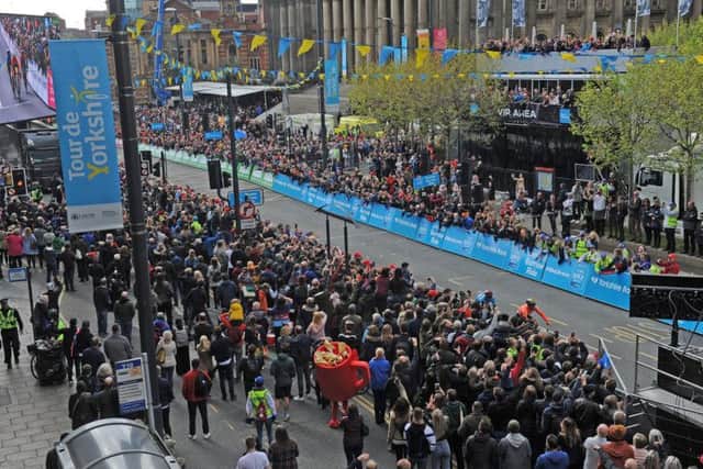Tour de France spectators on The Headrow in Leeds. Picture by Steve Riding.