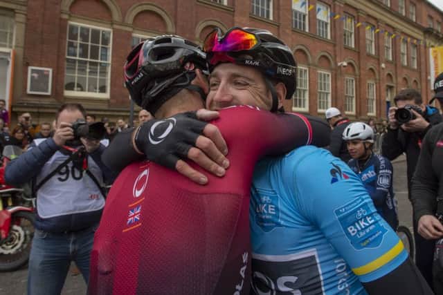 Tour de Yorkshire winner.
Chris Lawless, is congratulated on the finish line in Leeds. PIC: Bruce Rollinson