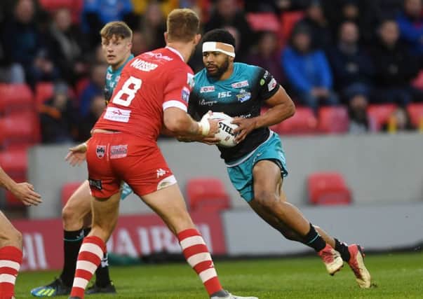 Leeds Rhinos' Kallum Watkins sets off on a run in the weekend defeat to Salford Red Devils. Picture: Jonathan Gawthorpe