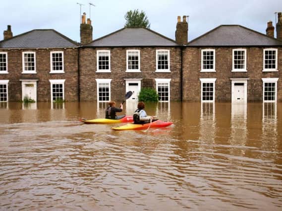 Ccanoeists taking advantage of the floods in Beverley, East Yorkshire. The 2007 floods brought devastation to Sheffield and Hull.