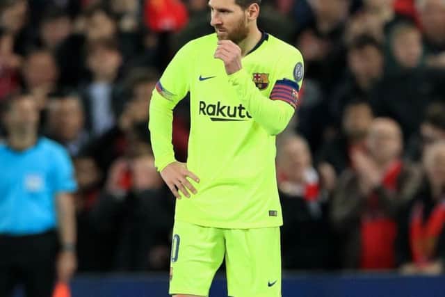 Lionel Messi looks stunned after Barcelona were smashed 4-0