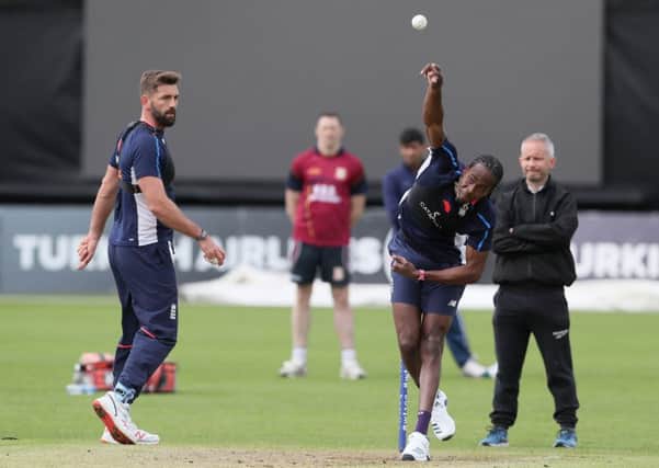 OVER TO YOU: Liam Plunkett keeps an eye on fellow pace bowler Jofra Archer during a recent practice session. Picture: Brian Lawless/PA Wire