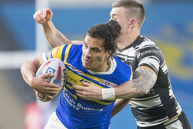 Ashton Golding is tackled by Hull FC's Jamie Shaul.