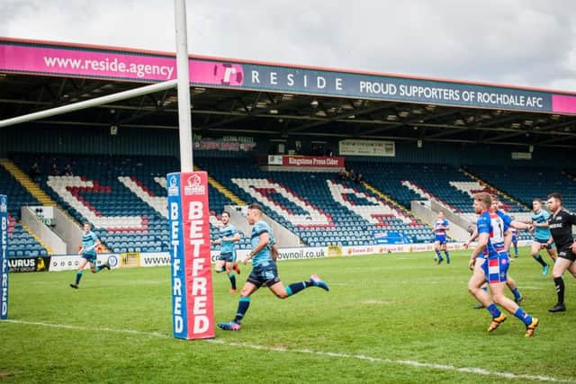 Dane Chisholm scores during Sunday's win over Rochdale Hornets. PIC: James Heaton.