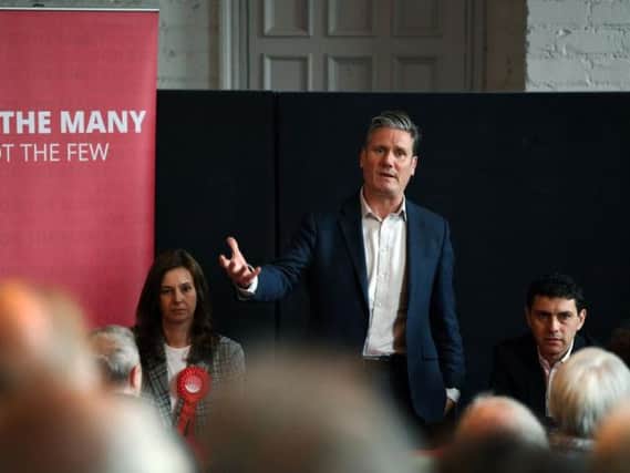 Keir Starmer speaking in Leeds alongside Labour MEP candidate Eloise Todd and Leeds North West MP Alex Sobel. Picture by Jonathan Gawthorpe.