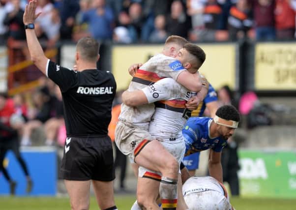 Bradford Bulls players celebrate at the final hooter.