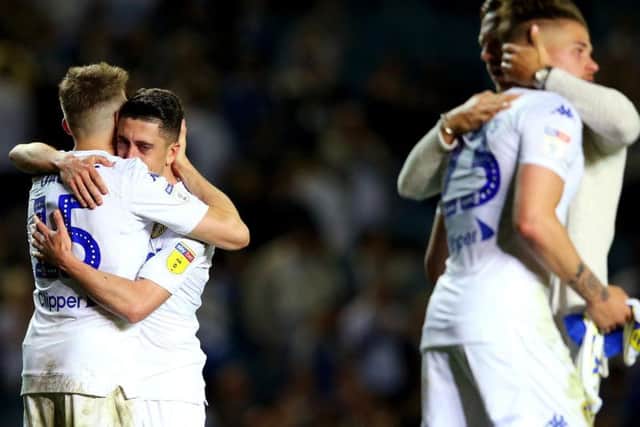 Leeds United players dejected after play-off defeat to Derby